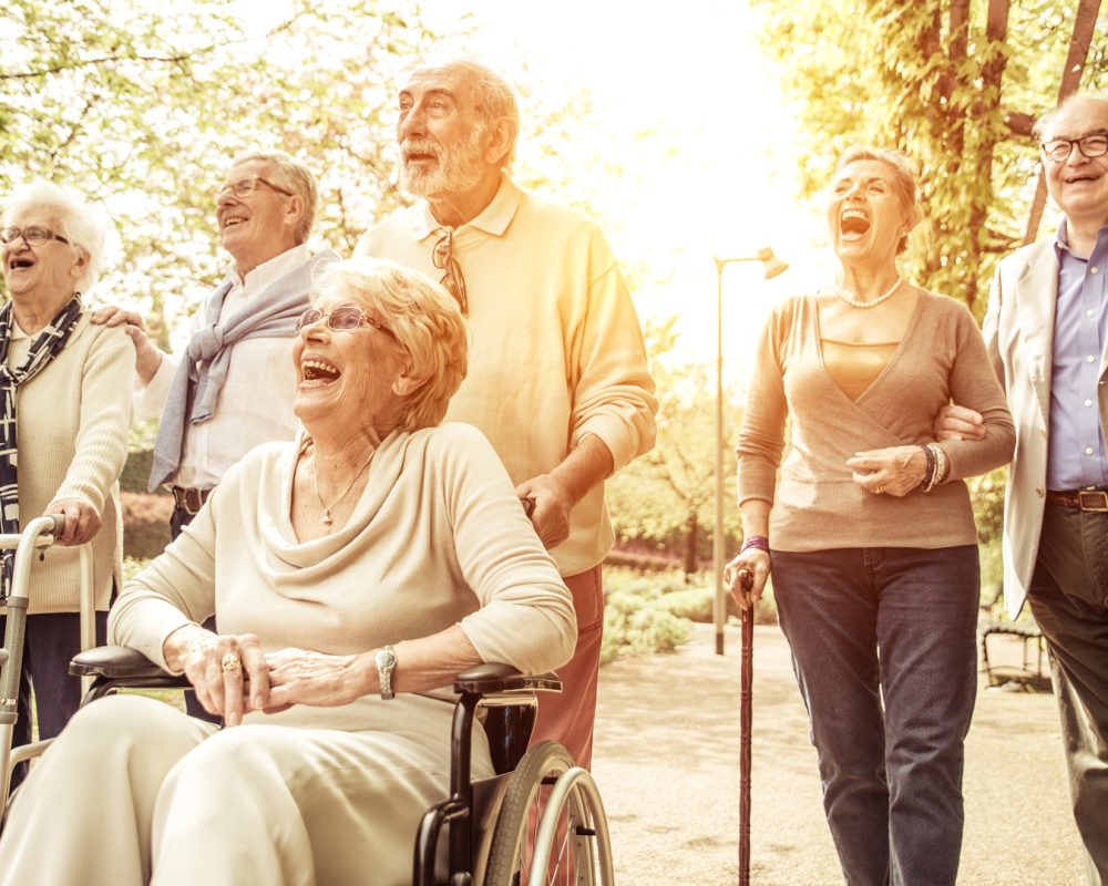 Group of old people walking outdoor